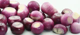 Fresh red onions showing layers and quercetin-rich color